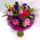 A variety of mixed cut flowers in vibrant colours - click to enlarge
